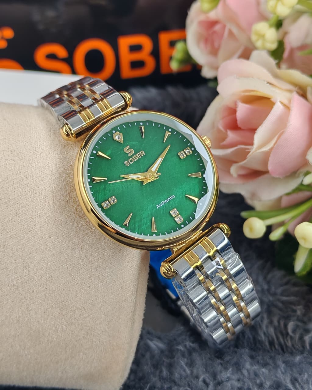 Sober Ladies Circular Watch with Green Dial and Gold Case