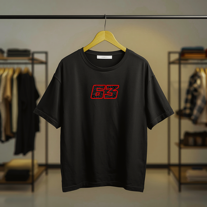 Black MotoGP motorcycle racing graphic T-shirt with racing numbers and motorcycle-inspired artwork on the front
