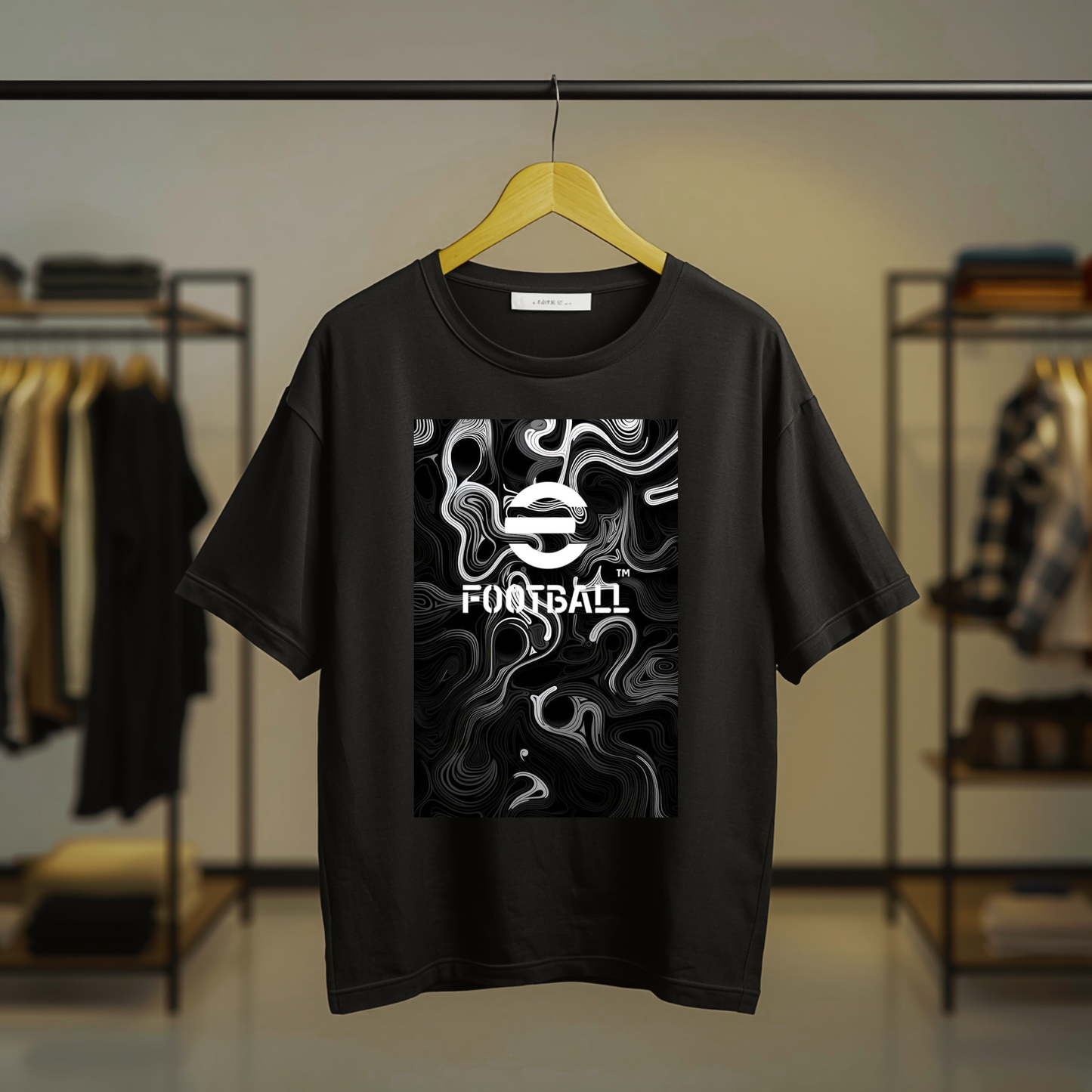 Black PES eFootball T-shirt featuring a large monochrome football graphic and eFootball logo on the front
