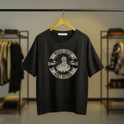 Mario racing in a kart graphic printed on a black T-shirt